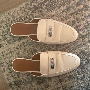 Leather coach slides